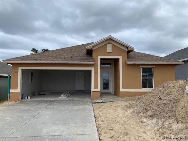 view of front of house with a garage