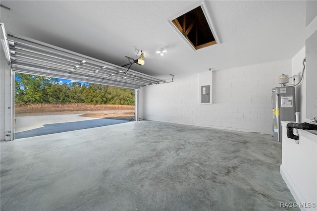 garage featuring a garage door opener, electric panel, and water heater