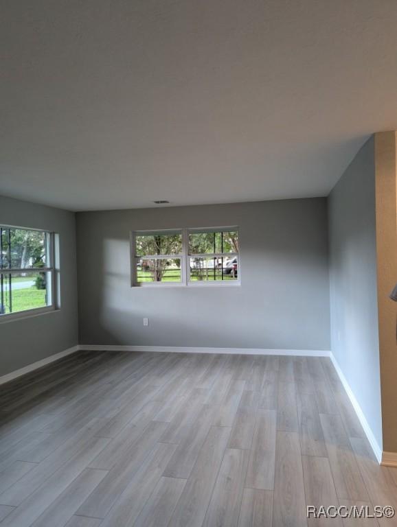 11 N Jefferson St, Beverly Hills, FL 34465 - unfurnished room with light wood-style floors and baseboards