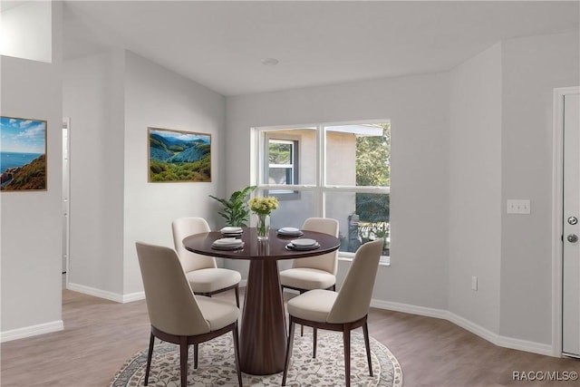 dining area featuring light hardwood / wood-style floors