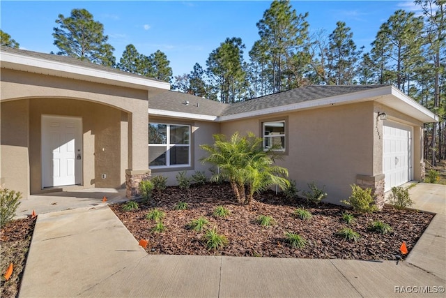 view of front of home with a garage