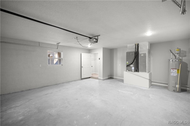 garage featuring electric water heater, heating unit, and a garage door opener