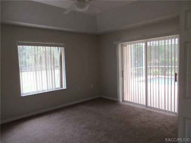 carpeted empty room with ceiling fan