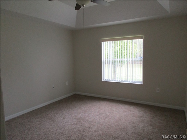 unfurnished room featuring carpet flooring and ceiling fan