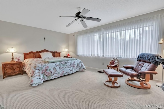 bedroom with carpet flooring and ceiling fan