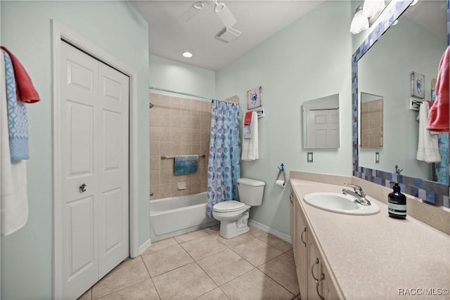 bathroom with toilet, a closet, visible vents, and tile patterned floors