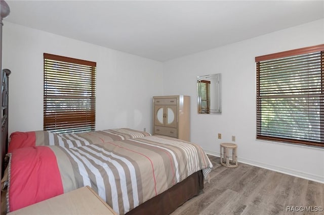 bedroom featuring light hardwood / wood-style flooring