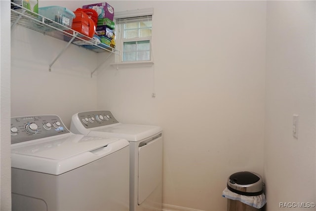 washroom with separate washer and dryer