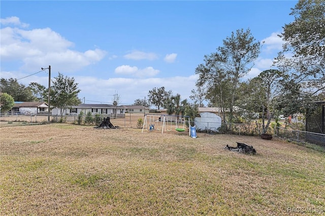 view of yard with a playground