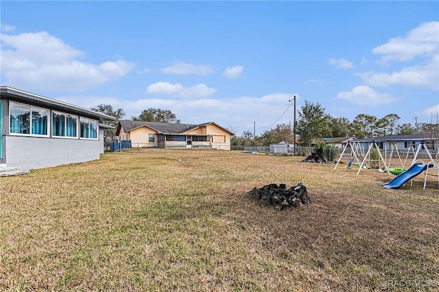 view of yard featuring a playground