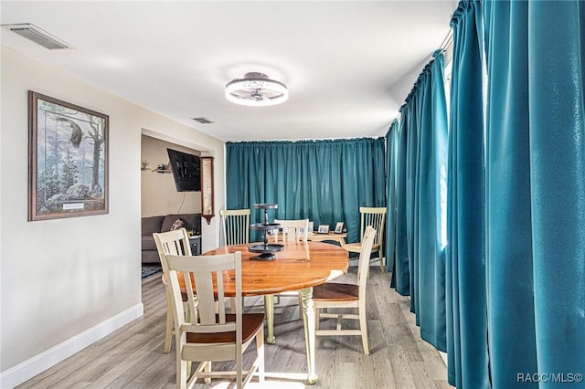 dining room featuring hardwood / wood-style flooring