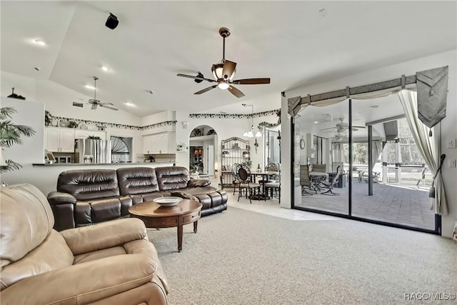 carpeted living room featuring lofted ceiling