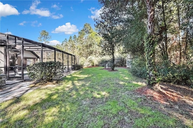 view of yard featuring a lanai