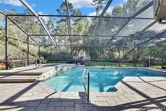 view of pool featuring a lanai and a patio