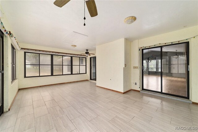 220 E Liberty St, Hernando, FL 34442 - spare room featuring a ceiling fan and baseboards