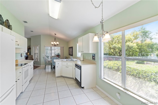 kitchen featuring kitchen peninsula, pendant lighting, extractor fan, white appliances, and white cabinets