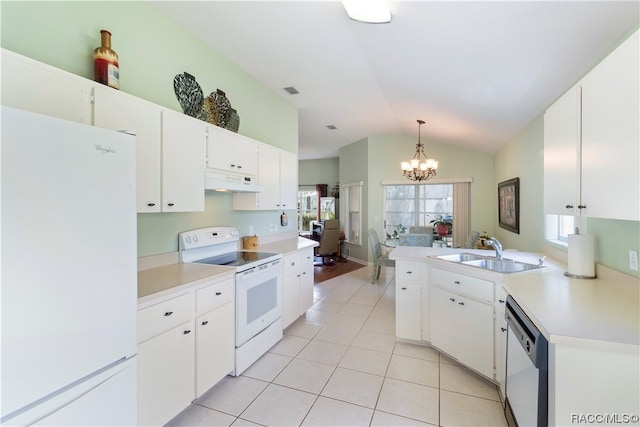 kitchen featuring white appliances, sink, hanging light fixtures, white cabinetry, and a chandelier