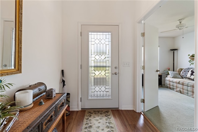 entrance foyer with wood-type flooring and ceiling fan