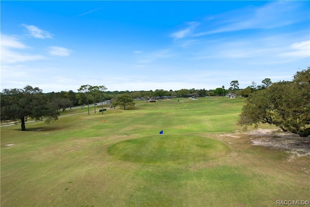 view of home's community with golf course view