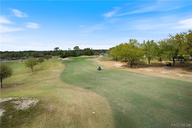 view of home's community with view of golf course