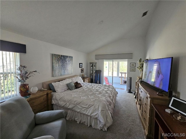 carpeted bedroom with lofted ceiling and access to exterior