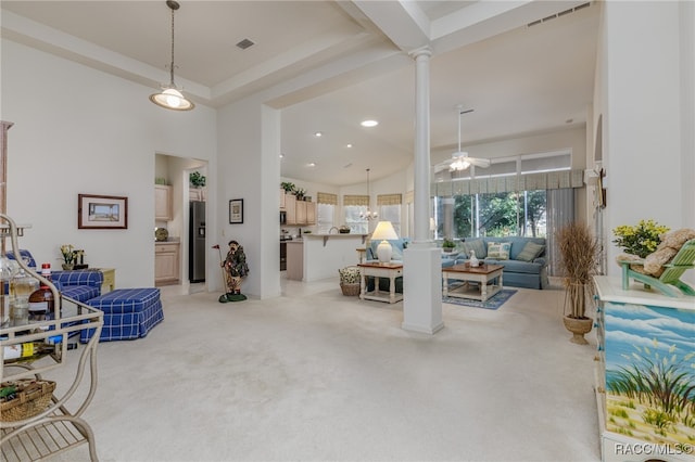 miscellaneous room featuring carpet floors, ornate columns, and ceiling fan