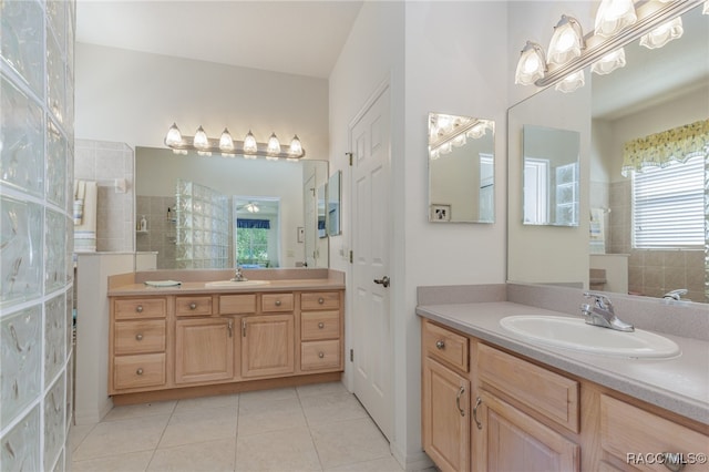 bathroom with tile patterned floors and vanity