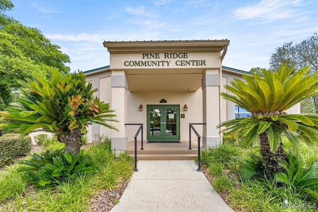 5352 W Corral Pl NW, Beverly Hills, FL 34465 - entrance to property with french doors and stucco siding