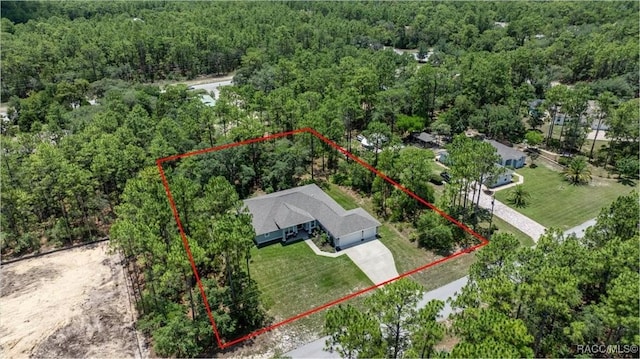 5352 W Corral Pl NW, Beverly Hills, FL 34465 - aerial view of property's location featuring a forest and property parcel outlined