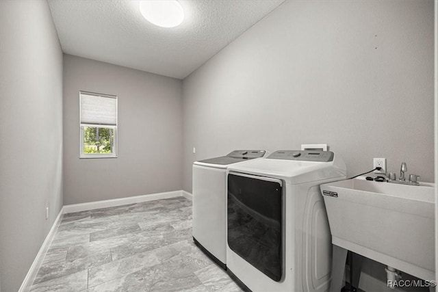 5352 W Corral Pl NW, Beverly Hills, FL 34465 - laundry area featuring independent washer and dryer and a textured ceiling