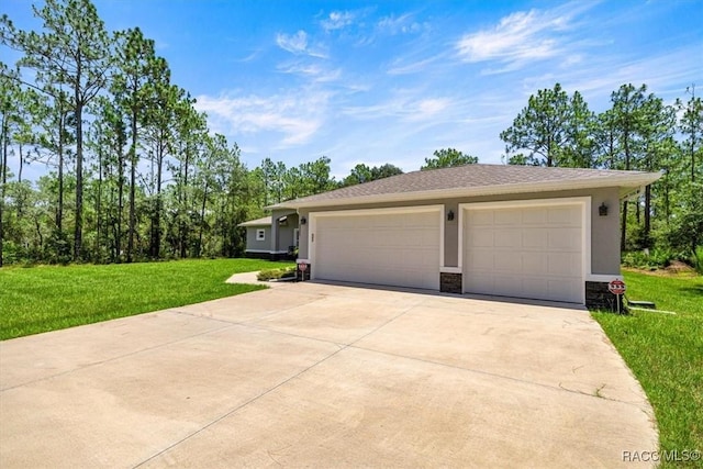 5352 W Corral Pl NW, Beverly Hills, FL 34465 - view of front of house with a front yard, stone siding, stucco siding, and concrete driveway