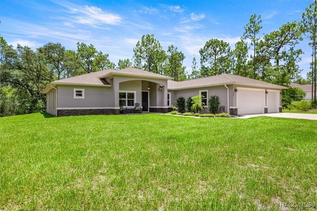 5352 W Corral Pl NW, Beverly Hills, FL 34465 - view of front of house featuring stucco siding, stone siding, an attached garage, a front yard, and driveway
