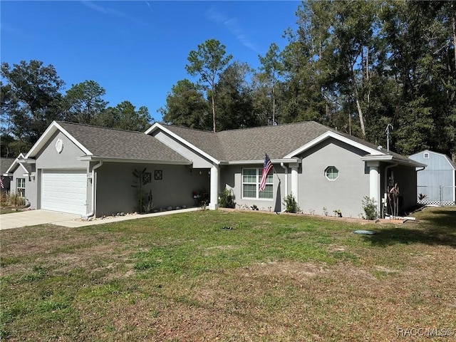 ranch-style house with a garage and a front lawn