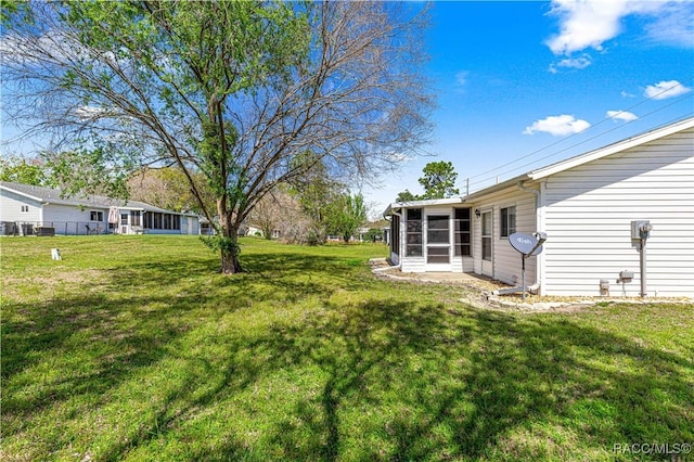10780 SW 62nd Avenue Rd, Ocala, FL 34476 - view of green lawn featuring a sunroom