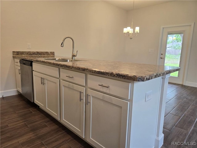 259 Bittern Loop, Inverness, FL 34453 - kitchen with a sink, white cabinetry, baseboards, stainless steel dishwasher, and dark wood-style floors