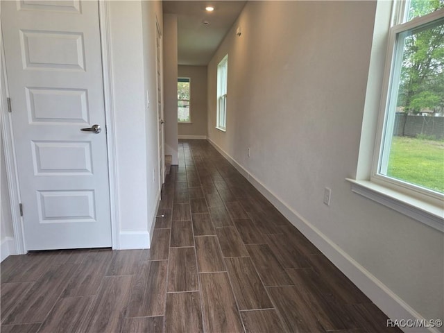 259 Bittern Loop, Inverness, FL 34453 - corridor featuring recessed lighting, baseboards, and dark wood-type flooring
