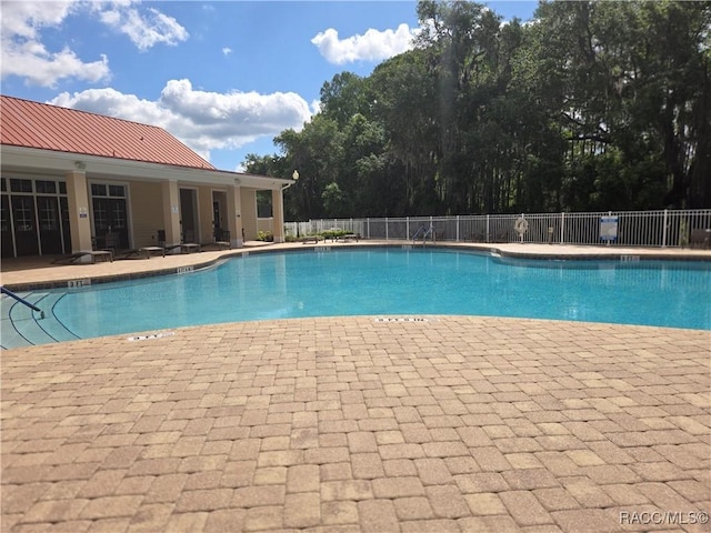 259 Bittern Loop, Inverness, FL 34453 - pool featuring a patio area and fence