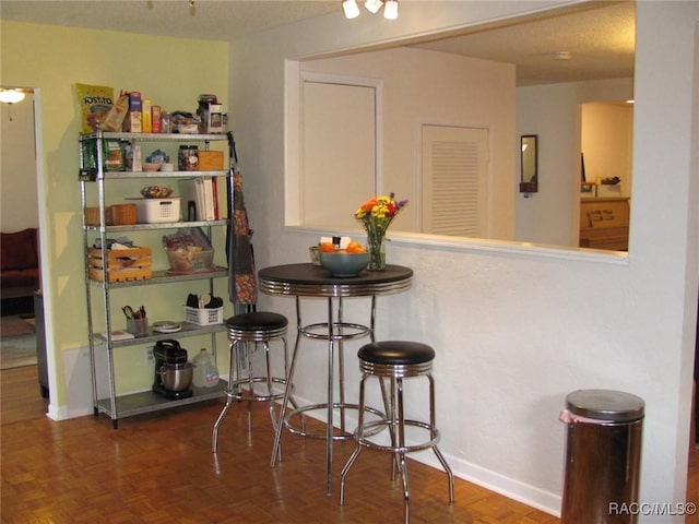 dining area with baseboards