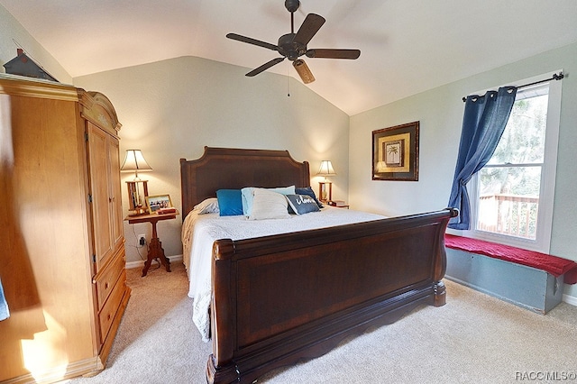 carpeted bedroom featuring ceiling fan and lofted ceiling