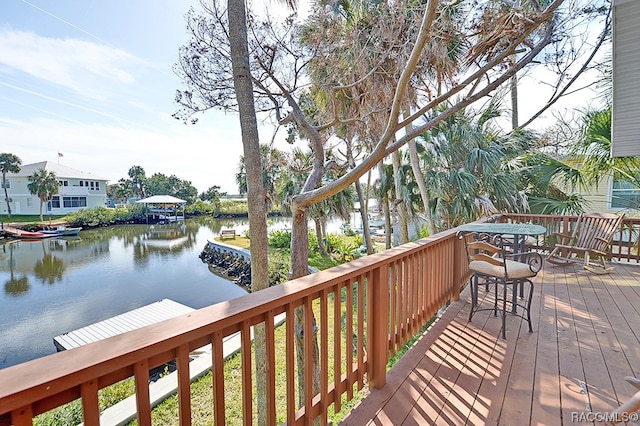 deck featuring a water view