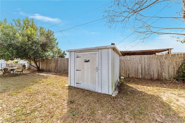 view of outdoor structure featuring a yard