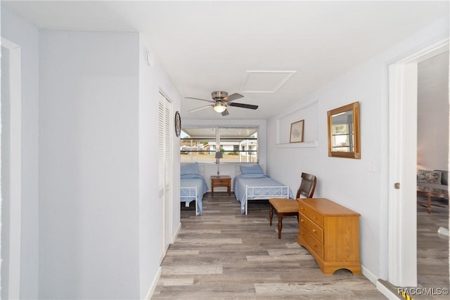 bedroom with a closet and light hardwood / wood-style flooring