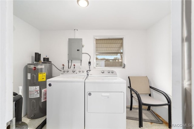 clothes washing area with electric panel, independent washer and dryer, and water heater