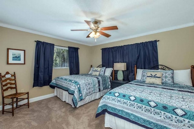 carpeted bedroom with crown molding and ceiling fan