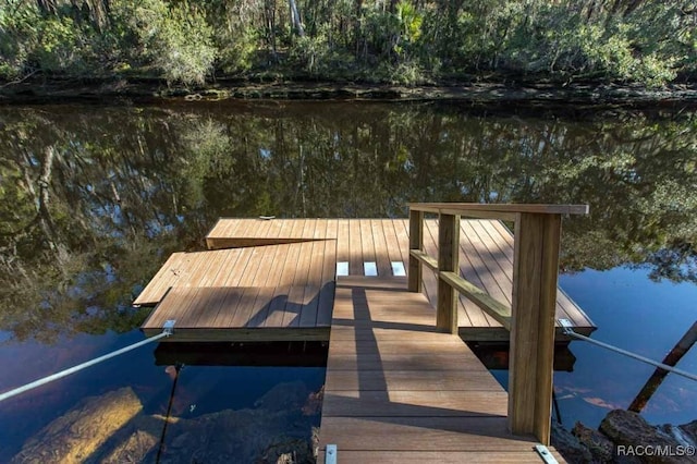 view of dock featuring a water view