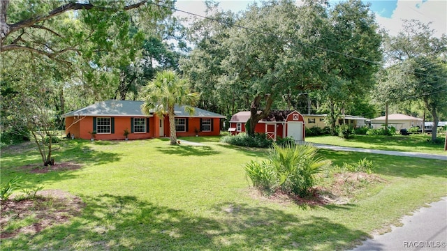 view of yard featuring a garage