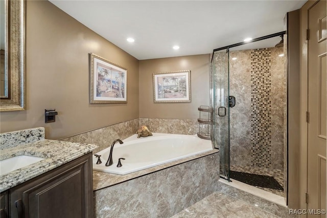 9950 S Ocean Dr Unit 302, Jensen Beach, FL 34957 - full bath featuring vanity, a shower stall, a bath, and recessed lighting