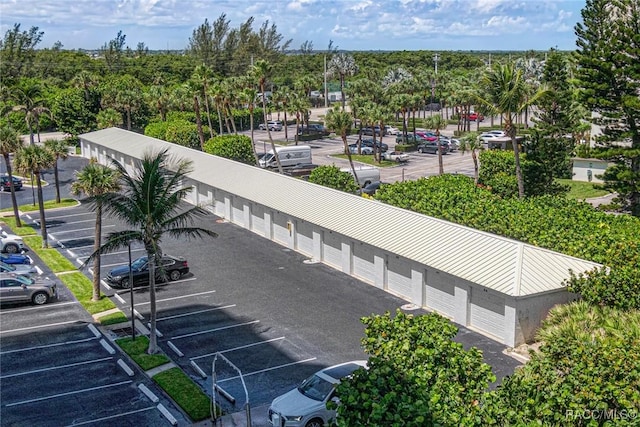 9950 S Ocean Dr Unit 302, Jensen Beach, FL 34957 - drone / aerial view of a tree filled landscape
