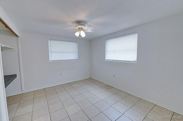 unfurnished bedroom with a closet and a ceiling fan