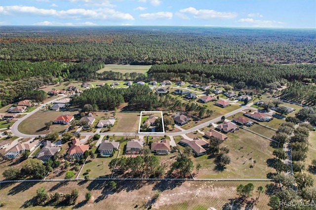 bird's eye view with a residential view and a forest view